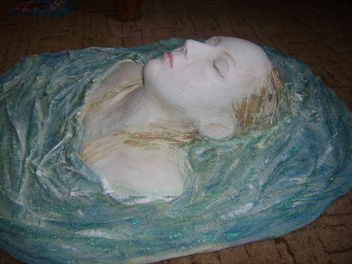 Sculpture made with wood,plaster,cloth,Acrylic paints,PVA and glitter glue