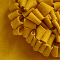 detail of yellow loop cushion