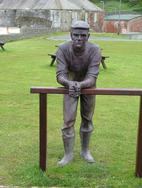 Man on the Beach, Port William, Scotland by Andrew Brown