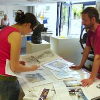 Open Studio - Cliff Wright with his prints and books