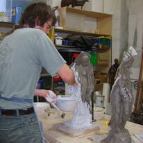Andrew casting  life figures in clay