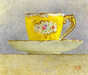 Yellow cup and saucer