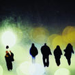 photograph of figures on acetate, stuck to a window and re-photographed on my window with view of city landscape at night