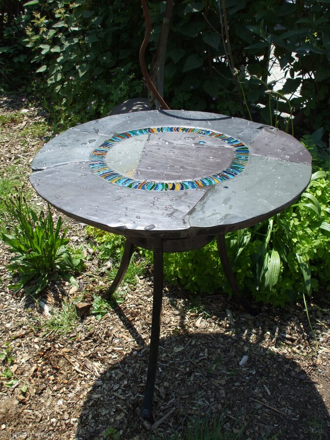 Wave Circle Design: hand made garden table on traditionally forged iron base