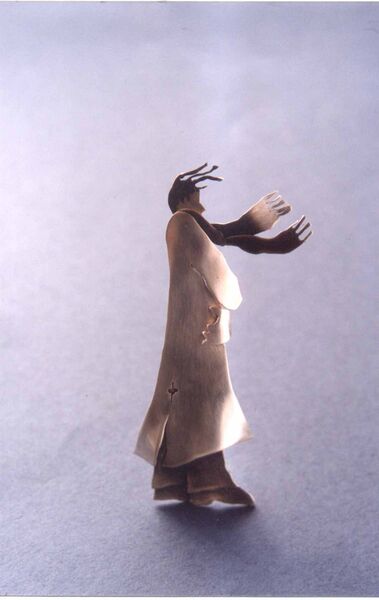 man with scarf blowing