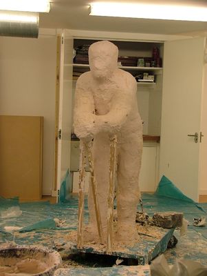 Clay original completely covered by plaster mould.