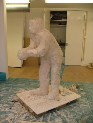 Filled mould has been put back together. Frame removed ready for chiselling off of the mould.