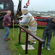Bronze is lowered into place.