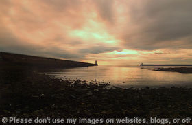 Sunrise over both, Tynemouth and South Shields Piers