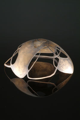 raised, etched and pierced bowl