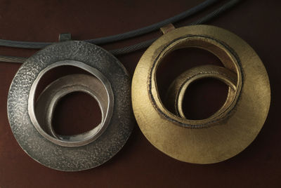 pendant one piece moves within the other