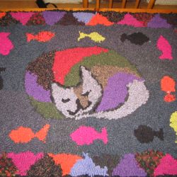 cat and fishes