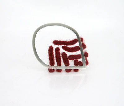 papilla brooch
