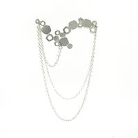 Lamella tethered Brooch