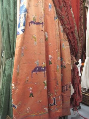 C2419 Orange Chinese panel with Small Embroidered Figures