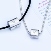 His and Hers ECHO 54 Abstract Heart Necklaces £105