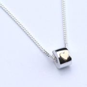 ECHO 65 Pure Heart Silver and 9ct Gold £57.00.