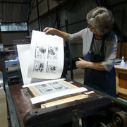 dru looking at print
