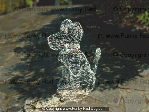 Big Sitting Wire Dog